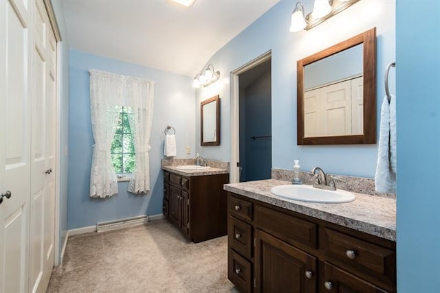 bathroom featuring double vanity