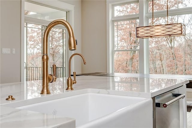 interior space featuring dishwasher and a tub