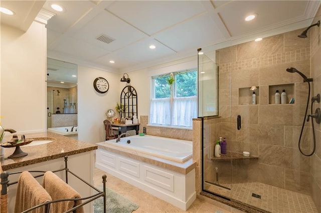 bathroom with tile flooring, vanity, and independent shower and bath