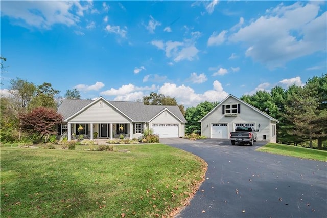 view of front facade with a front lawn and a garage