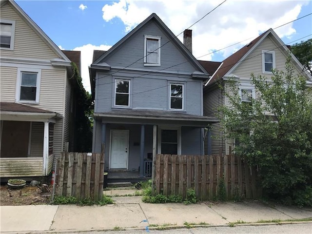 view of front property featuring a porch