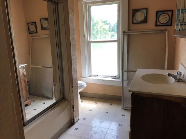 full bathroom with vanity, tile flooring, shower / bathtub combination, and toilet