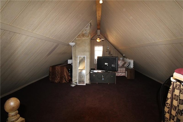 bedroom featuring wooden ceiling, vaulted ceiling, and dark carpet