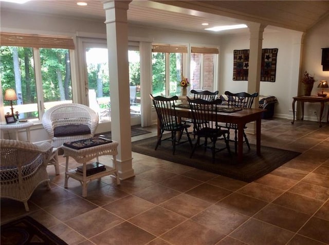 tiled dining space with decorative columns