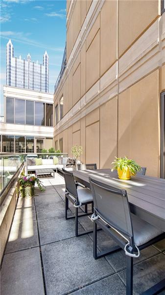 view of patio with a balcony