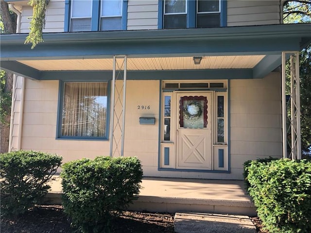 entrance to property with covered porch