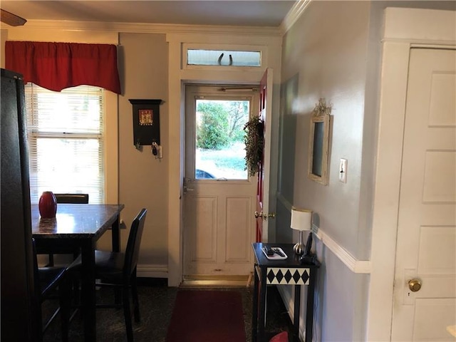 dining space featuring ornamental molding