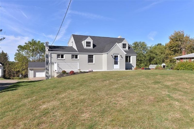 cape cod-style house with a front yard