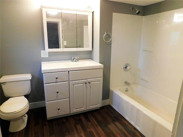 full bathroom with toilet, bathtub / shower combination, vanity, and hardwood / wood-style flooring