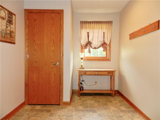 interior space featuring light tile floors