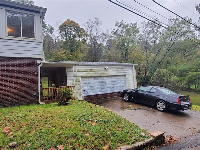 garage with a lawn