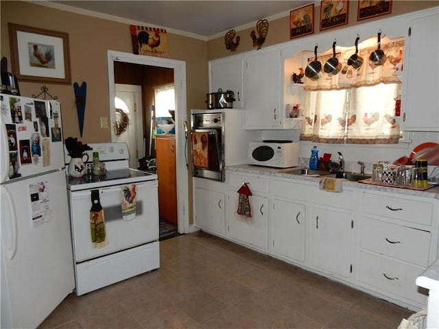 kitchen with white cabinetry, white appliances, light tile flooring, and sink