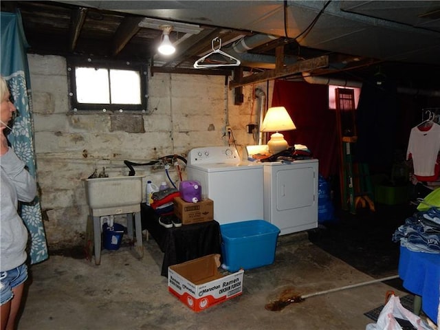 basement featuring washer and dryer