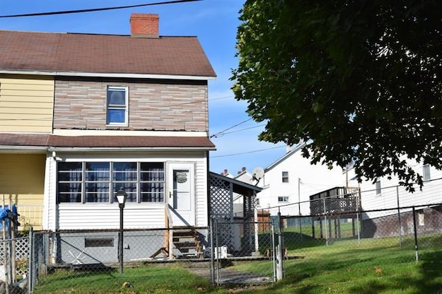 view of home's exterior featuring a lawn