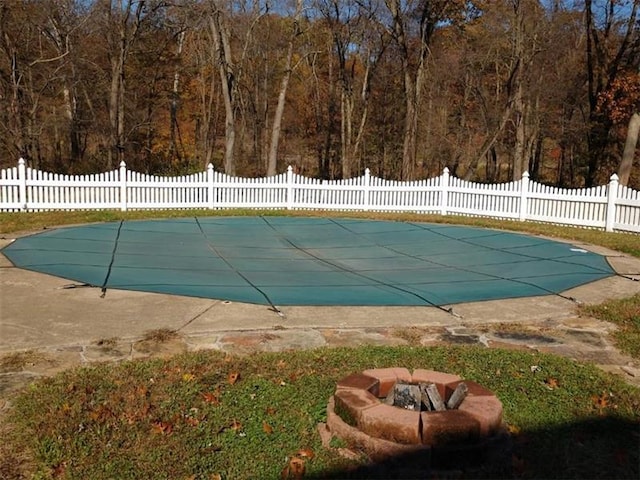 view of swimming pool featuring a patio