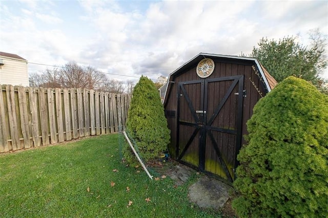 view of outdoor structure with a lawn