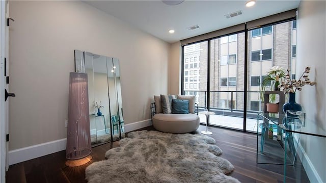 living area featuring dark hardwood / wood-style floors