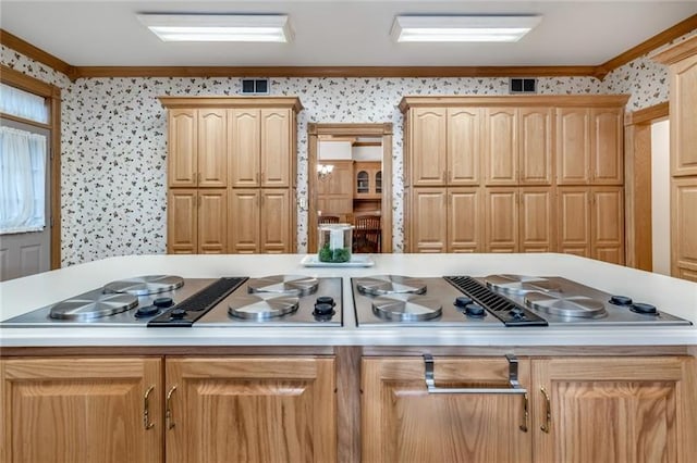 kitchen with light brown cabinets and crown molding