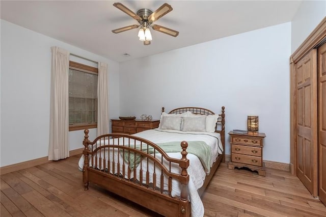 bedroom featuring ceiling fan and light hardwood / wood-style flooring