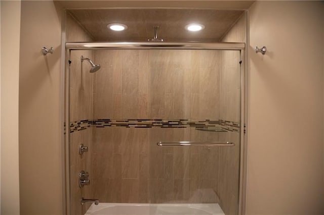 bathroom featuring enclosed tub / shower combo