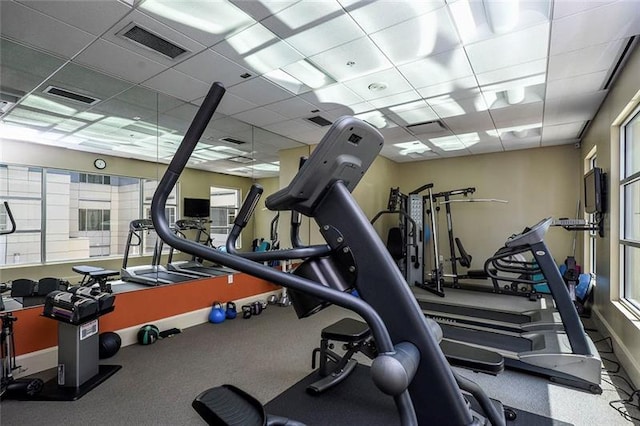 gym with a drop ceiling