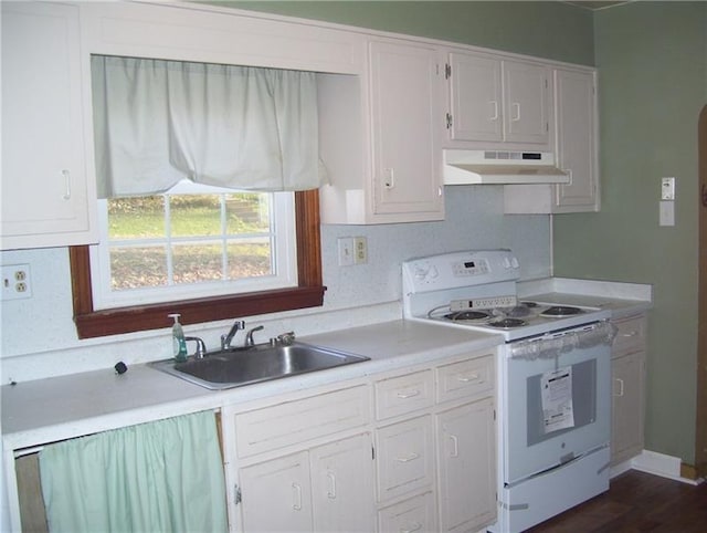 kitchen with white cabinetry, electric stove, dark hardwood / wood-style floors, and sink