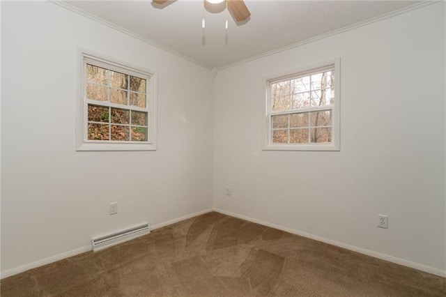 carpeted empty room featuring ceiling fan, baseboard heating, and ornamental molding