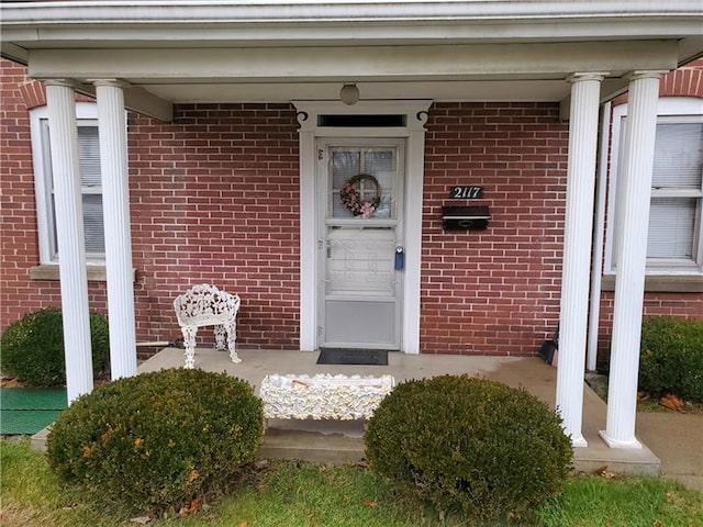 doorway to property featuring a porch