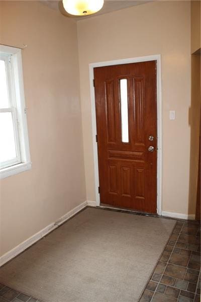 view of tiled entrance foyer