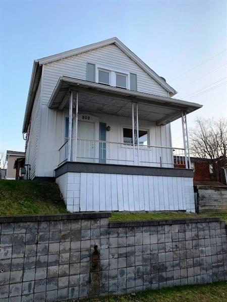 view of property exterior with a balcony