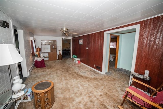 interior space with carpet and ceiling fan