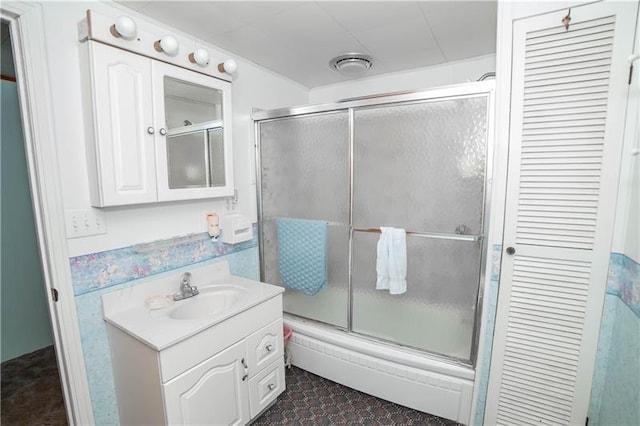 bathroom featuring tile floors and vanity