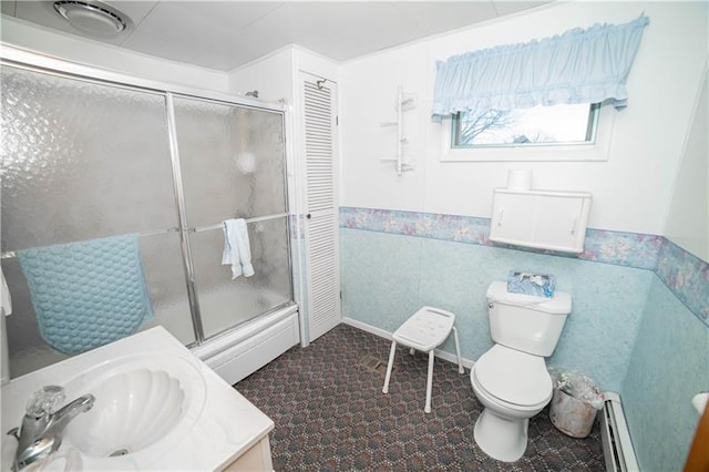 bathroom with an enclosed shower, vanity, tile flooring, and toilet