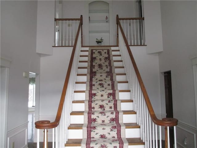 stairs with a towering ceiling