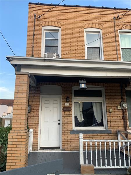 doorway to property featuring covered porch