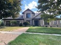 view of front of property with a front lawn