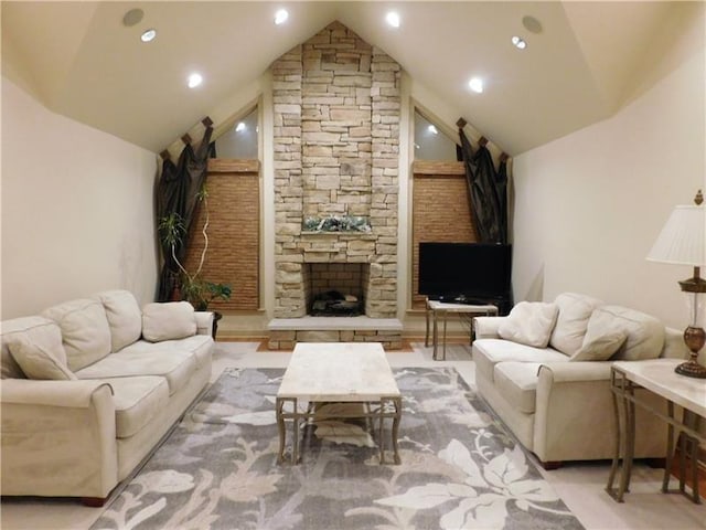 living room with a fireplace and vaulted ceiling