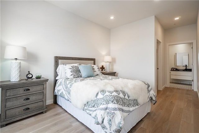 bedroom featuring light hardwood / wood-style floors