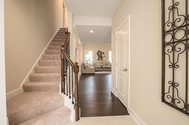 entrance foyer with dark hardwood / wood-style floors