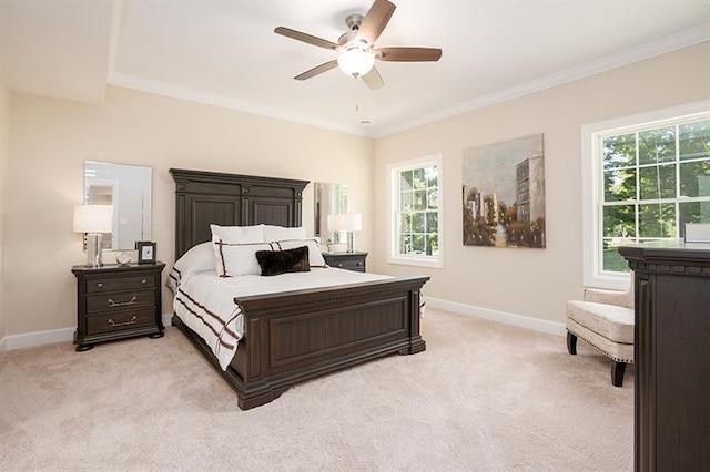 bedroom with multiple windows, crown molding, and light colored carpet