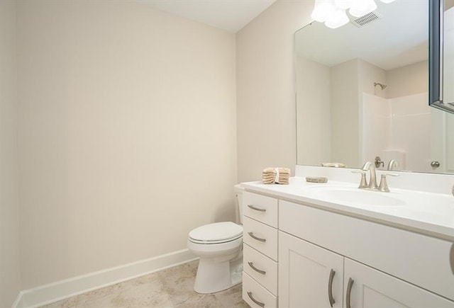 bathroom with oversized vanity, tile flooring, and toilet