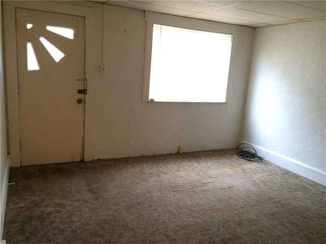 view of carpeted entrance foyer