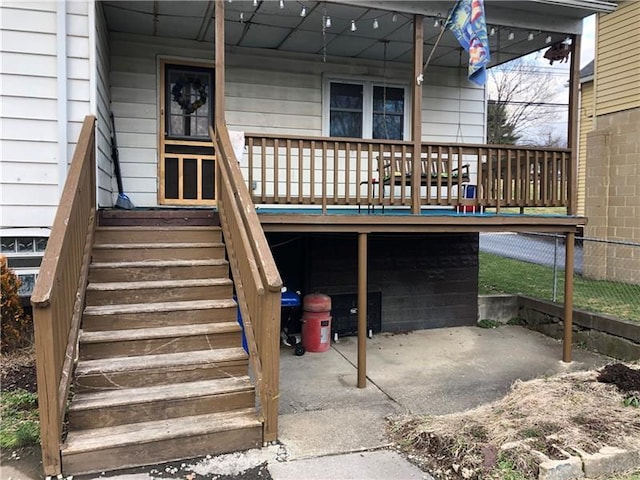 entrance to property with a deck