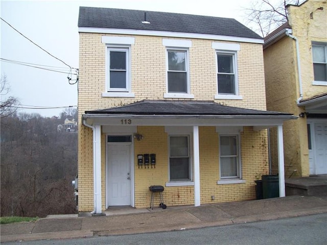 view of front of property featuring covered porch