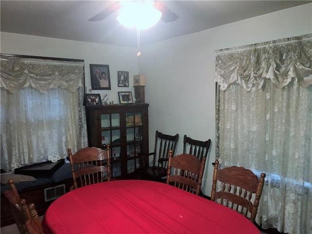 dining room featuring ceiling fan