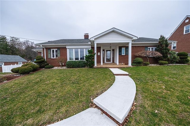 view of front of house with a front yard