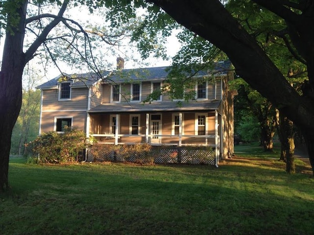 exterior space with a front lawn