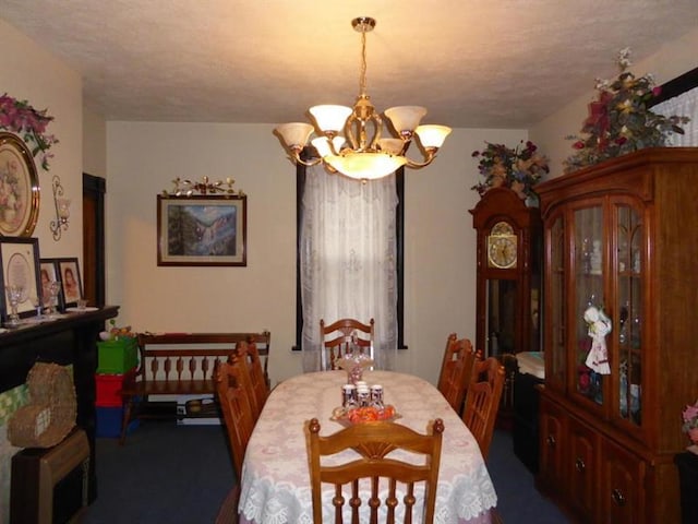 dining area featuring a chandelier