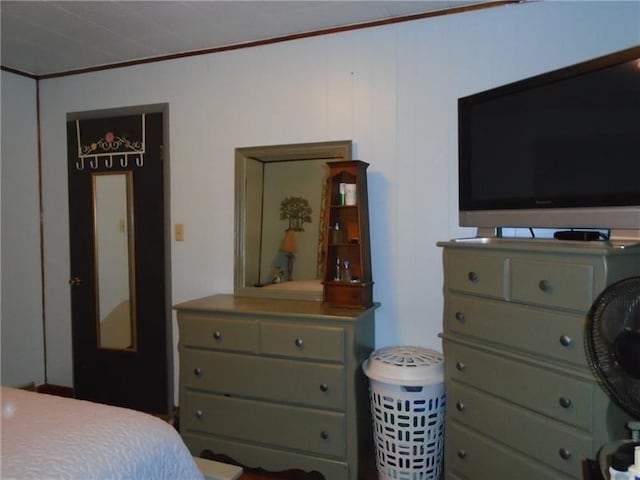 bedroom with ornamental molding