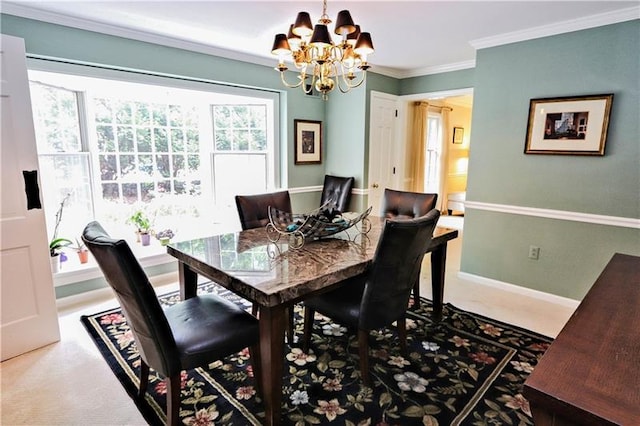 carpeted dining area with crown molding and an inviting chandelier